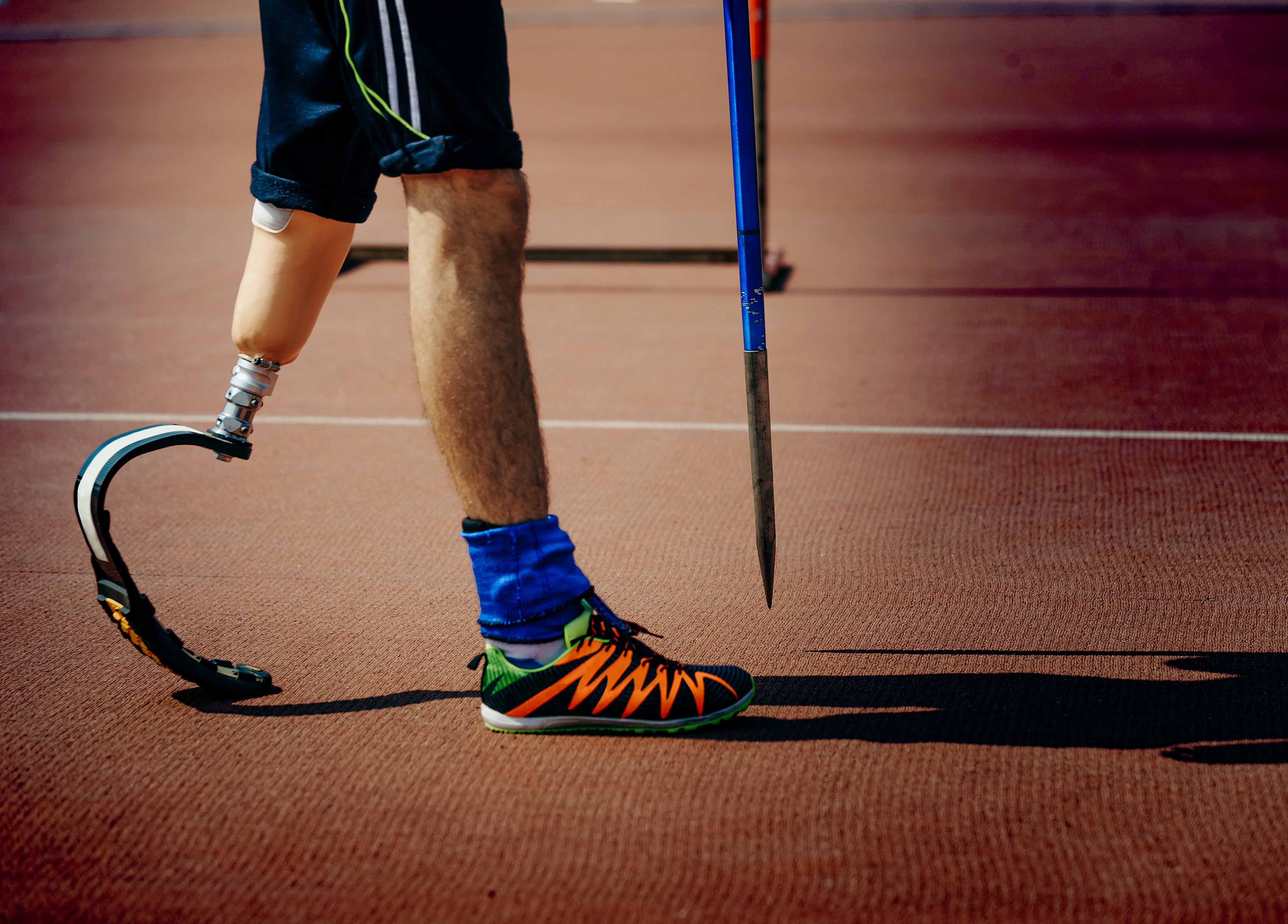 disabled athlete man with prosthetic leg