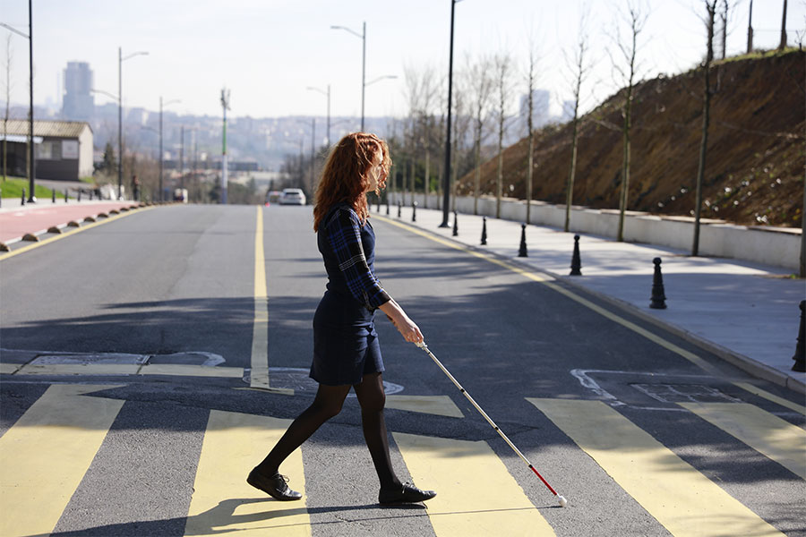 blind woman walking