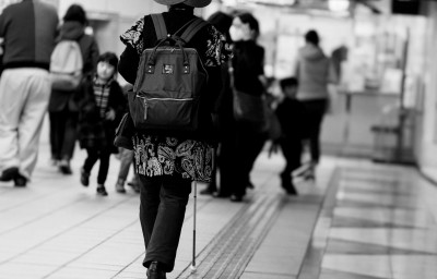 Blind Woman walking at the station