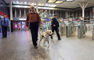 blind man goes to the subway in St. Petersburg