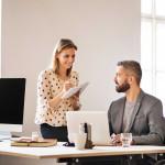 Two business people in the office.