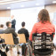 woman on wheelchair attending the conference