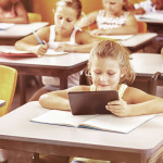 School kids studying in classroom at school