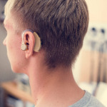 young-man-with-hearing-aid