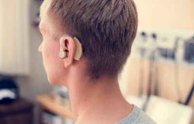 young-man-with-hearing-aid