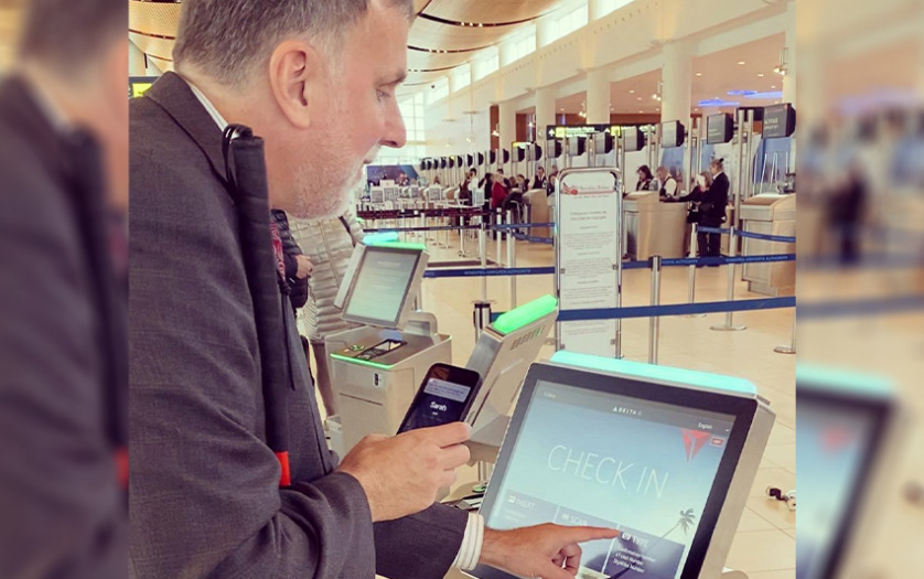 blind person using the app at Winnipeg airport