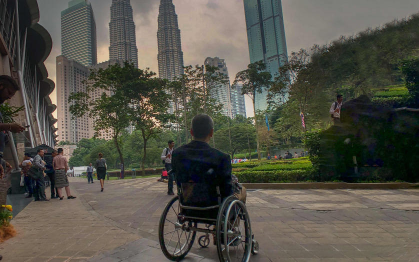 wheelchair user looking at the Twin Towers