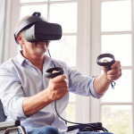 a man in wheelchair doing exercise using VR headset