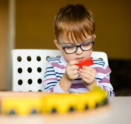 boy with disability playing