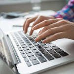 woman using computer