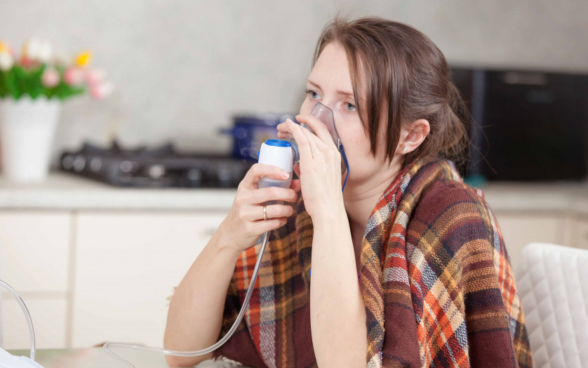 young-woman doing inhalation at home