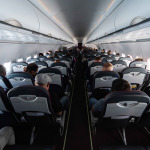 Single-Aisle Airplane cabin seats with passengers