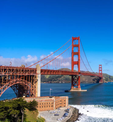 Golden gate bridge over blue waters with scenic hills in san francisco