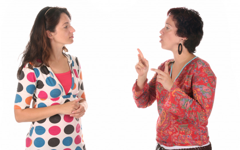 Two women chatting in sign Language