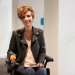 Female university student with disability smiling to camera