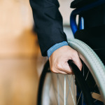 close up hands for a wheelchair user