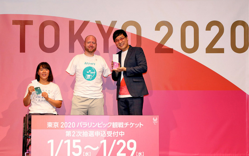 (from left to right) Paralympians Monika Seryu, Matt Stutzman and Japanese comedian Ryota Yamasato hold the tickets for the Tokyo 2020 Games