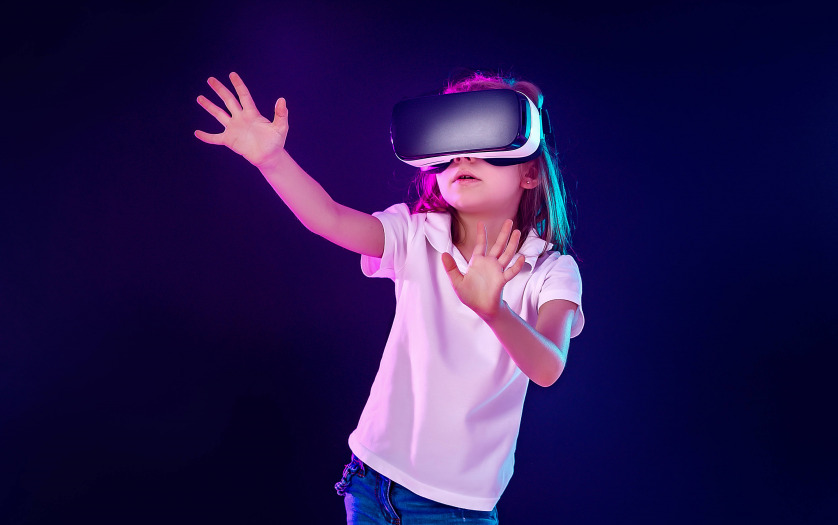 child using a gaming gadget for virtual reality