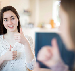 Teenage Girls Having Conversation Using Sign Language