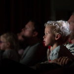 kid watching movie