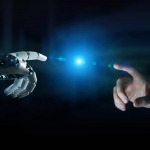 Robot hand making contact with human hand on dark background