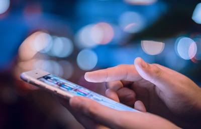 Woman hands using mobile smart phone