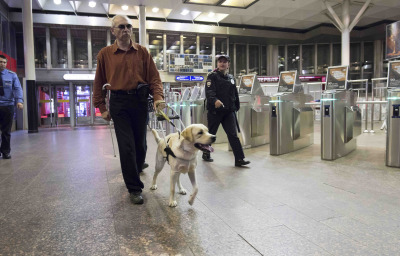 a blind man with guide dog