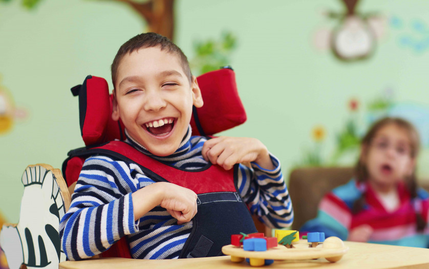 smiling kid with disability