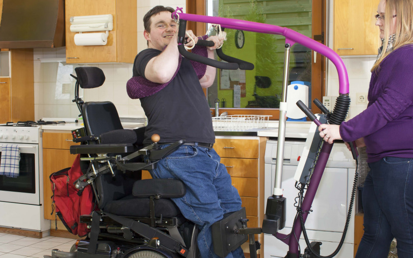 a man with disability doing exercise at home