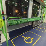 Wheelchair sign in the designated wheelchair space on a train