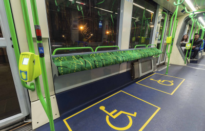 Wheelchair sign in the designated wheelchair space on a train