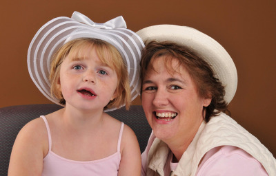 girl with Down Syndrome with her mother