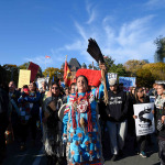woman chanting slogans during a solidarity rally with the Pipeline protesters