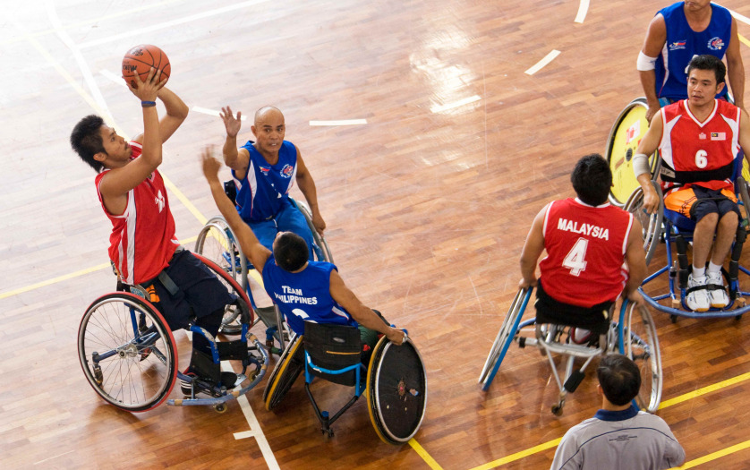 men's wheelchair basketball match between Malaysia (red) and Philippines (blue)