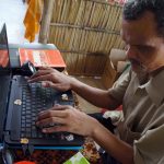 blind man working on computer