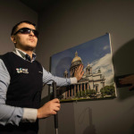 blind persons touching the tactile painting