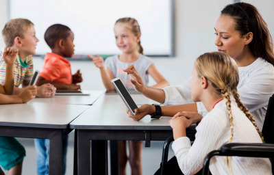 Teacher having lesson with tablet pc