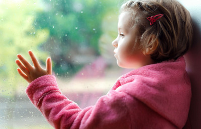 Girl looking out of the window