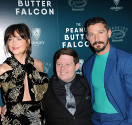 Dakota Johnson, Zack Gottsagen and Shia LaBeouf at the Los Angeles premiere of `The Peanut Butter Falcon`