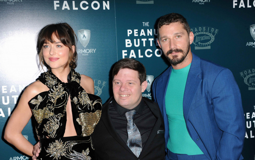 Dakota Johnson, Zack Gottsagen and Shia LaBeouf at the Los Angeles premiere of `The Peanut Butter Falcon`