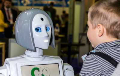 lively and interesting conversation between a child and a robot