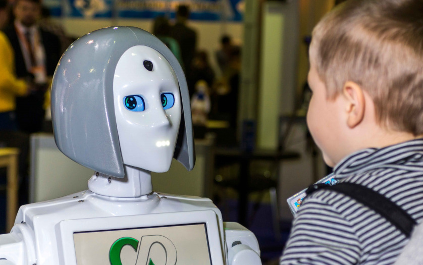 lively and interesting conversation between a child and a robot