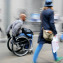blurred movement disabled man on a city street
