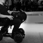 wheelchair user leaving the building