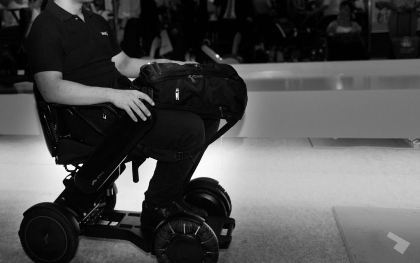 wheelchair user leaving the building