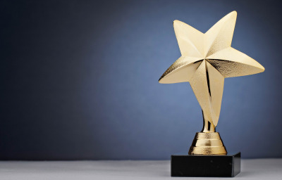 Shiny star statue award made of gold