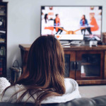 girl watching Corona virus news