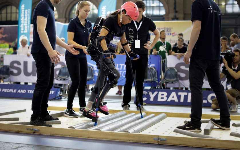 a woman athletes participating in Cybathlon