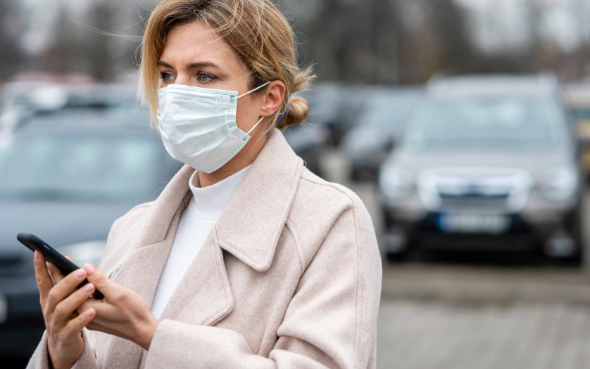 Portrait of blonde woman with surgical mask