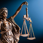 Bronze figurine of Lady Justice with her scales